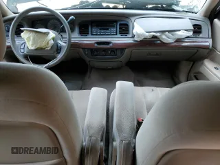 2003 Mercury Grand Marquis GS Convenience z VIN 2MEFM74W03X647685, wystawiony jako Copart lot #54104505 z przebiegiem 67 396 mil mil oraz Szkody całkowita. Historia ofert i sprzedaży dostępna na DreamBid. Obrazek 8.