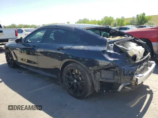 2021 BMW 8 Series M850i with VIN WBAGV8C00MCF55108, listed as a Copart auction lot 56305084 with 27,399 mi miles and Salvage Title. Bid and sale history available at carsss.com. Image 2.