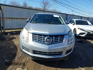 2015 Cadillac SRX with VIN 3GYFNAE39FS591106, listed as a IAAI auction lot 41539502 with 179,182 mi miles and . Bid and sale history available at DreamBid. Image 13.