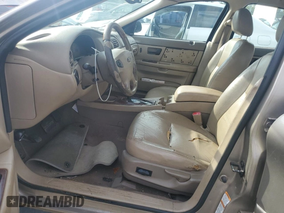 2003 Ford Taurus SEL Deluxe with VIN 1FAHP56SX3A243775, listed as a Copart auction lot 72245394 with 251,041 mi miles and Salvage Title. Bid and sale history available at DreamBid. Image 7.