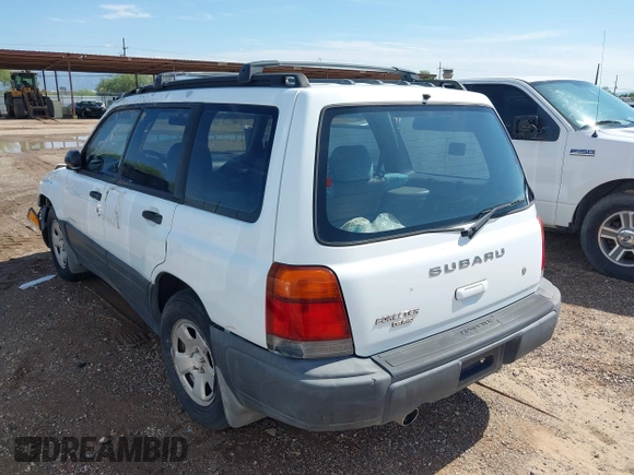1999 Subaru Forester L with VIN JF1SF6353XH741228, listed as a IAAI auction lot 39377894 with 156,243 mi miles. Bid and sale history available at carsss.com. Image 3.