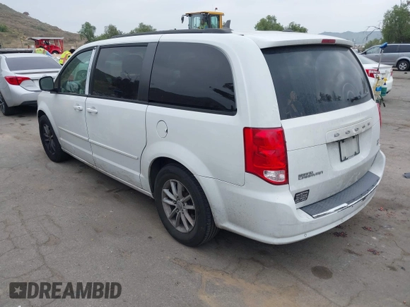 2014 Dodge Grand Caravan SXT with VIN 2C4RDGCG1ER304836, listed as a IAAI auction lot 42049558 with 186,831 mi miles and . Bid and sale history available at DreamBid. Image 3.