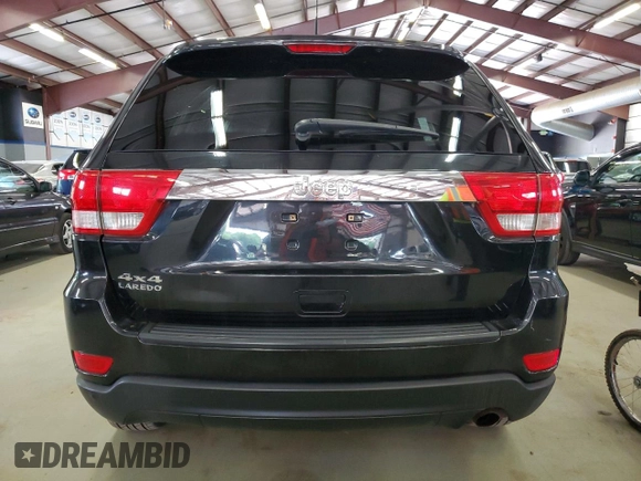 2011 Jeep Grand Cherokee Laredo with VIN 1J4RR4GG9BC521723, listed as a Copart auction lot 64126795 with 198,145 mi miles and Clean title. Bid and sale history available at DreamBid. Image 6.
