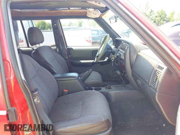 1999 Jeep Cherokee Sport with VIN 1J4FT68S1XL504294, listed as a IAAI auction lot 42509063 with 225,661 mi miles and . Bid and sale history available at DreamBid. Image 5.