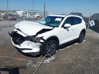 2018 Mazda CX-5 Grand Touring with VIN JM3KFBDM0J0404635, listed as a IAAI auction lot 41883068 with 71,178 mi miles. Bid and sale history available at carsss.com. Image 19.