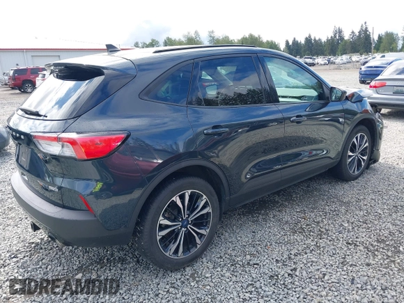 2022 Ford Escape SE Hybrid z VIN 1FMCU9BZ5NUA06681, wystawiony jako IAAI lot #42302156 z przebiegiem 61 582 mil mil oraz . Historia ofert i sprzedaży dostępna na DreamBid. Obrazek 4.