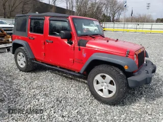 2015 Jeep Wrangler Unlimited Willys Wheeler with VIN 1C4BJWDG2FL542045, listed as a Copart auction lot 52903465 with 86,205 mi miles and Clean Title. Bid and sale history available at DreamBid. Image 4.