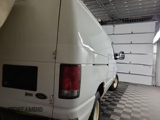 2010 Ford Econoline Cargo Commercial with VIN 1FTNE1EW4ADA91052, listed as a IAAI auction lot 42607935 with 163,519 mi miles and . Bid and sale history available at DreamBid. Image 21.