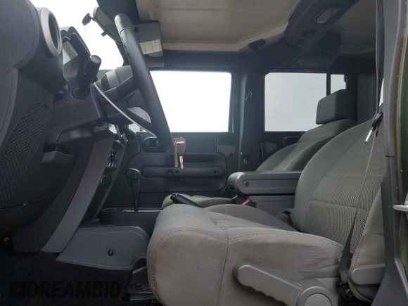 2008 Jeep Wrangler Unlimited Sahara with VIN 1J4GB59108L653823, listed as a Copart auction lot 56324635 with 170,831 mi miles and Clean title. Bid and sale history available at DreamBid. Image 7.