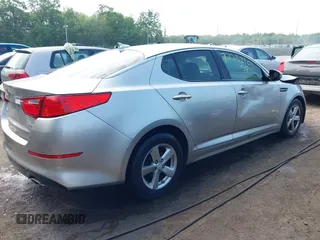 2015 Kia Optima LX z VIN 5XXGM4A77FG464481, wystawiony jako IAAI lot #42282701 z przebiegiem 88 528 mil mil oraz . Historia ofert i sprzedaży dostępna na DreamBid. Obrazek 4.
