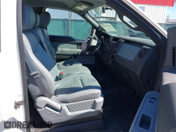 2014 Ford F-150 XL with VIN 1FTMF1CM1EKE41667, listed as a IAAI auction lot 41847599 with 31,671 mi miles and . Bid and sale history available at DreamBid. Image 5.