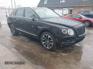 2019 Bentley Bentayga V8 z VIN SJAAM2ZVXKC025218, wystawiony jako IAAI lot #41741586 z przebiegiem 52 457 mil mil oraz . Historia ofert i sprzedaży dostępna na DreamBid. Obrazek 1.