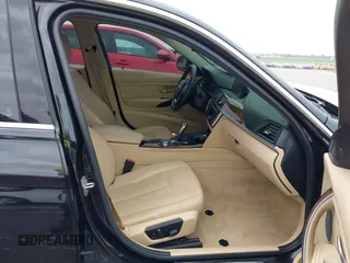 2015 BMW 3 Series 328i xDrive z VIN WBA3B5G56FNS18880, wystawiony jako IAAI lot #42454124 z przebiegiem 63 217 mil mil oraz . Historia ofert i sprzedaży dostępna na DreamBid. Obrazek 5.