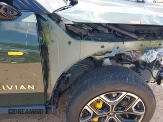 2023 Rivian R1T Adventure z VIN 7FCTGAAAXPN019894, wystawiony jako IAAI lot #42168226 z przebiegiem 23 380 mil mil oraz . Historia ofert i sprzedaży dostępna na DreamBid. Obrazek 20.