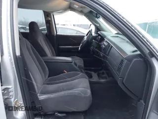 2004 Dodge Dakota SLT with VIN 1D7HG48N34S665027, listed as a IAAI auction lot 41395509 with 128,064 mi miles. Bid and sale history available at carsss.com. Image 5.