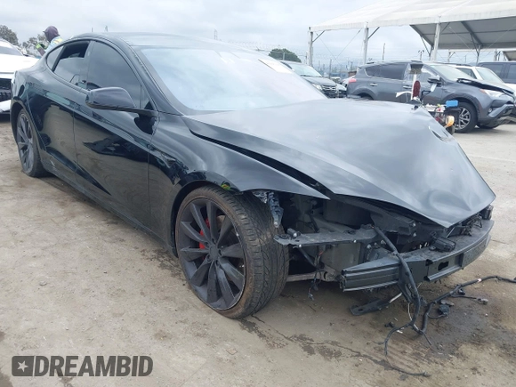 2017 Tesla Model S 60 with VIN 5YJSA1E12HF195965, listed as a IAAI auction lot 41946148 with 63,992 mi miles and . Bid and sale history available at DreamBid. Image 1.