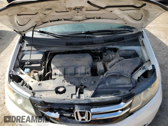 2014 Honda Odyssey Touring z VIN 5FNRL5H92EB059168, wystawiony jako Copart lot #76121914 z przebiegiem 264 715 mil mil oraz Szkoda całkowita • Salvage title. Historia ofert i sprzedaży dostępna na DreamBid. Obrazek 13.