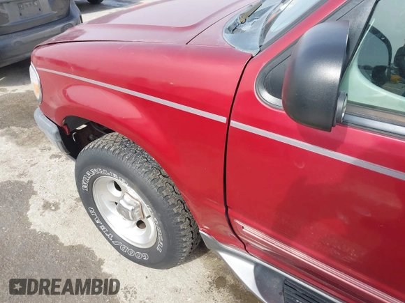 1998 Ford Explorer XL z VIN 1FMZU34E2WZB30557, wystawiony jako IAAI lot #41597870 z przebiegiem 164 778 mil mil oraz . Historia ofert i sprzedaży dostępna na DreamBid. Obrazek 12.