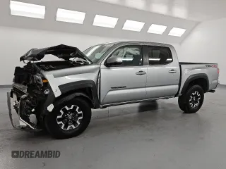 2023 Toyota Tacoma SR z VIN 3TMCZ5AN3PM541979, wystawiony jako Copart lot #54566845 z przebiegiem 26 264 mil mil oraz Czysty tytuł • Clean title. Historia ofert i sprzedaży dostępna na DreamBid. Obrazek 1.