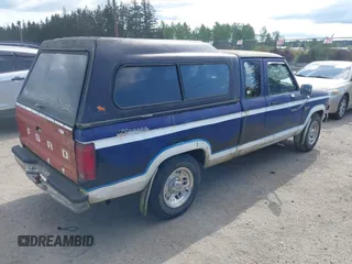 1987 Ford Ranger XL with VIN 1FTCR14A7HPB48449, listed as a IAAI auction lot 42169102 with 29,193 mi miles and . Bid and sale history available at DreamBid. Image 4.
