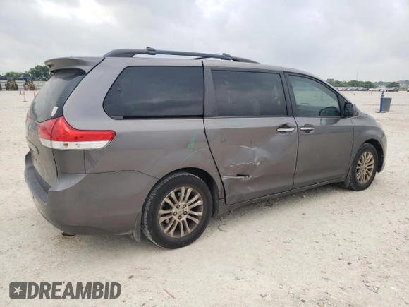 2014 Toyota Sienna XLE with VIN 5TDYK3DC2ES510647, listed as a Copart auction lot 54488845 with 216,091 mi miles and Salvage Title. Bid and sale history available at DreamBid. Image 3.