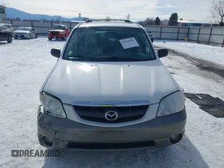 2003 Mazda Tribute ES with VIN 4F2CZ96133KM22960, listed as a IAAI auction lot 41550181 with 159,412 mi miles. Bid and sale history available at carsss.com. Image 13.