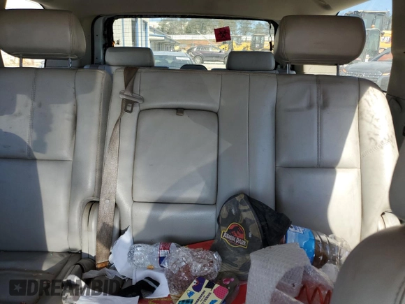 2007 GMC Yukon SLE with VIN 1GKFK13017J109923, listed as a Copart auction lot 77085954 with 214,986 mi miles and Salvage Title. Bid and sale history available at carsss.com. Image 10.