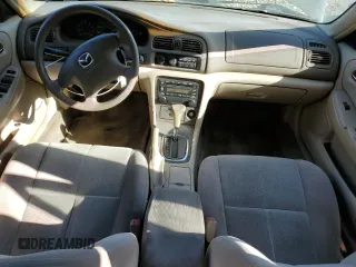 2002 Mazda 626 LX with VIN 1YVGF22D225276396, listed as a Copart auction lot 78723644 with 129,595 mi miles and Salvage Title. Bid and sale history available at carsss.com. Image 8.