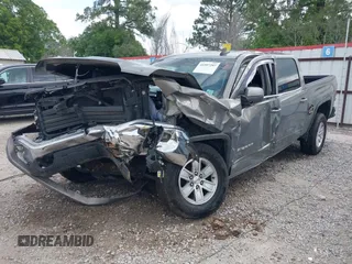 2017 GMC Sierra 1500 SLE z VIN 3GTP1MEC0HG230277, wystawiony jako IAAI lot #41997297 z przebiegiem Nie podano mil oraz . Historia ofert i sprzedaży dostępna na DreamBid. Obrazek 17.