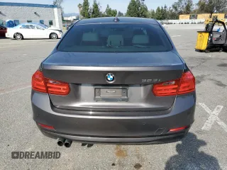2014 BMW 3 Series 328i with VIN WBA3C1C56EK113493, listed as a Copart auction lot 52188375 with 94,507 mi miles and Salvage title. Bid and sale history available at DreamBid. Image 6.