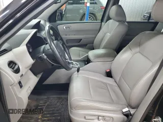 2014 Honda Pilot EX-L with VIN 5FNYF4H75EB011062, listed as a Copart auction lot 57830935 with 128,847 mi miles and Salvage title. Bid and sale history available at DreamBid. Image 7.