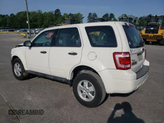 2010 Ford Escape XLS with VIN 1FMCU0C76AKB82752, listed as a Copart auction lot 57626565 with 194,931 mi miles and Salvage title. Bid and sale history available at DreamBid. Image 2.