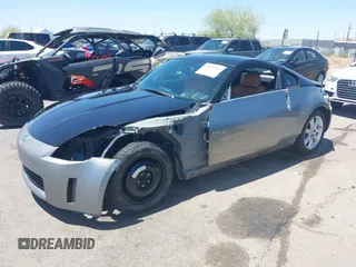 2004 Nissan 350Z Enthusiast z VIN JN1AZ34D74T164233, wystawiony jako IAAI lot #42509421 z przebiegiem 90 780 mil mil oraz . Historia ofert i sprzedaży dostępna na DreamBid. Obrazek 19.