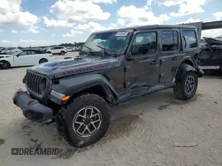 2024 Jeep Wrangler Rubicon with VIN 1C4PJXFG6RW261748, listed as a Copart auction lot 44166485 with 7,911 mi miles and Salvage Title. Bid and sale history available at DreamBid. Image 1.