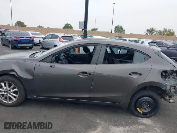 2015 Mazda 3 i Touring with VIN JM1BM1L7XF1261134, listed as a IAAI auction lot 42164554 with 130,570 mi miles and . Bid and sale history available at DreamBid. Image 15.