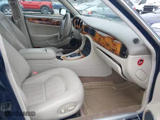 1998 Jaguar XJ with VIN SAJHX124XWC844575, listed as a IAAI auction lot 41951600 with 97,458 mi miles. Bid and sale history available at carsss.com. Image 5.