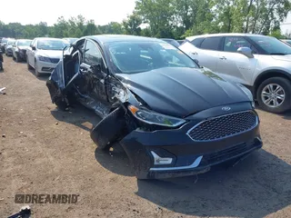 2020 Ford Fusion Titanium with VIN 3FA6P0K93LR119947, listed as a IAAI auction lot 42586133 with 136,153 mi miles and . Bid and sale history available at DreamBid. Image 1.
