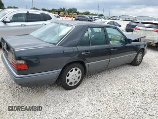 1994 Mercedes-Benz E Class with VIN WDBEA32EXRC074761, listed as a Copart auction lot 70322754 with 0 mi miles and Salvage Title. Bid and sale history available at carsss.com. Image 3.