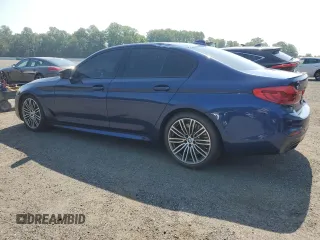 2020 BMW 5 Series M550i xDrive with VIN WBAJS7C0XLBN96338, listed as a Copart auction lot 60591815 with 73,910 mi miles and Salvage title. Bid and sale history available at DreamBid. Image 2.