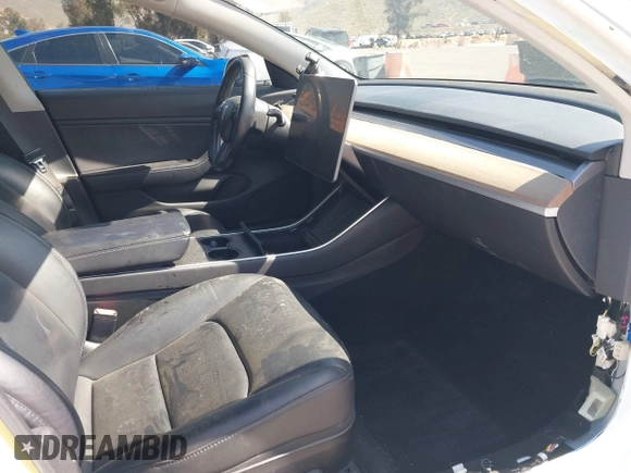 2018 Tesla Model 3 Long Range Battery with VIN 5YJ3E1EAXJF108781, listed as a IAAI auction lot 41962628 with 61,208 mi miles and . Bid and sale history available at DreamBid. Image 5.