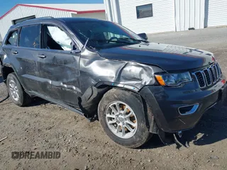 2018 Jeep Grand Cherokee Laredo E with VIN 1C4RJFAG8JC335459, listed as a IAAI auction lot 41850163 with 93,289 mi miles. Bid and sale history available at carsss.com. Image 6.