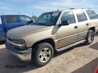 2005 Chevrolet Tahoe LS with VIN 1GNEC13V25R204089, listed as a IAAI auction lot 41075336 with 164,937 mi miles and . Bid and sale history available at DreamBid. Image 2.