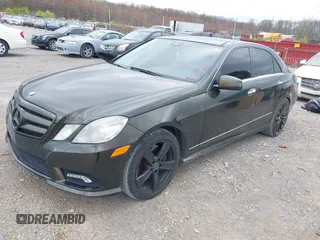 2010 Mercedes-Benz E-Class E 550 Luxury with VIN WDDHF9AB4AA128264, listed as a IAAI auction lot 41842230 with 216,724 mi miles. Bid and sale history available at carsss.com. Image 23.