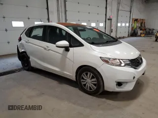 2017 Honda Fit LX z VIN 3HGGK5H54HM703696, wystawiony jako Copart lot #50496465 z przebiegiem 105 801 mil mil oraz Szkoda całkowita • Salvage title. Historia ofert i sprzedaży dostępna na DreamBid. Obrazek 4.