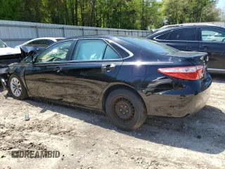 2017 Toyota Camry XLE z VIN 4T1BF1FK0HU700820, wystawiony jako Copart lot #52010655 z przebiegiem Nie podano mil oraz Szkoda całkowita • Salvage title. Historia ofert i sprzedaży dostępna na DreamBid. Obrazek 2.