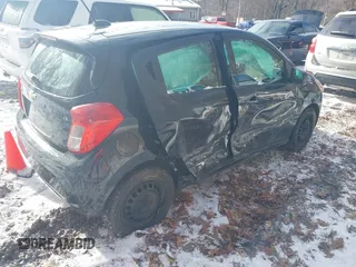 2016 Chevrolet Spark LS with VIN KL8CB6SA3GC613523, listed as a IAAI auction lot 41040412 with 84,698 mi miles. Bid and sale history available at carsss.com. Image 4.
