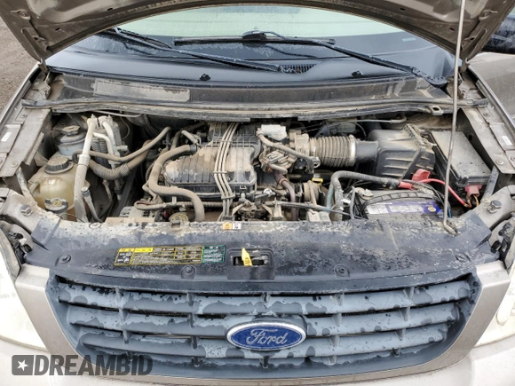 2005 Ford Freestar z VIN 2FMDA57275BA59115, wystawiony jako Copart lot #57058445 z przebiegiem 100 831 mil mil oraz Szkoda całkowita • Salvage title. Historia ofert i sprzedaży dostępna na DreamBid. Obrazek 12.