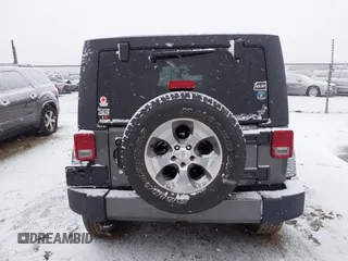 2017 Jeep Wrangler Unlimited Sahara with VIN 1C4BJWEG4HL591149, listed as a IAAI auction lot 41542157 with 70,630 mi miles. Bid and sale history available at carsss.com. Image 16.