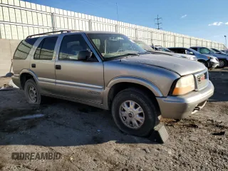 2001 GMC Jimmy SLE with VIN 1GKDT13W212223469, listed as a Copart auction lot 73249724 with 171,606 mi miles and Salvage Title. Bid and sale history available at carsss.com. Image 4.