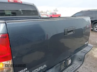 2008 Toyota Tundra z VIN 5TFDV54198X077455, wystawiony jako IAAI lot #41668660 z przebiegiem 164 008 mil mil oraz . Historia ofert i sprzedaży dostępna na DreamBid. Obrazek 19.